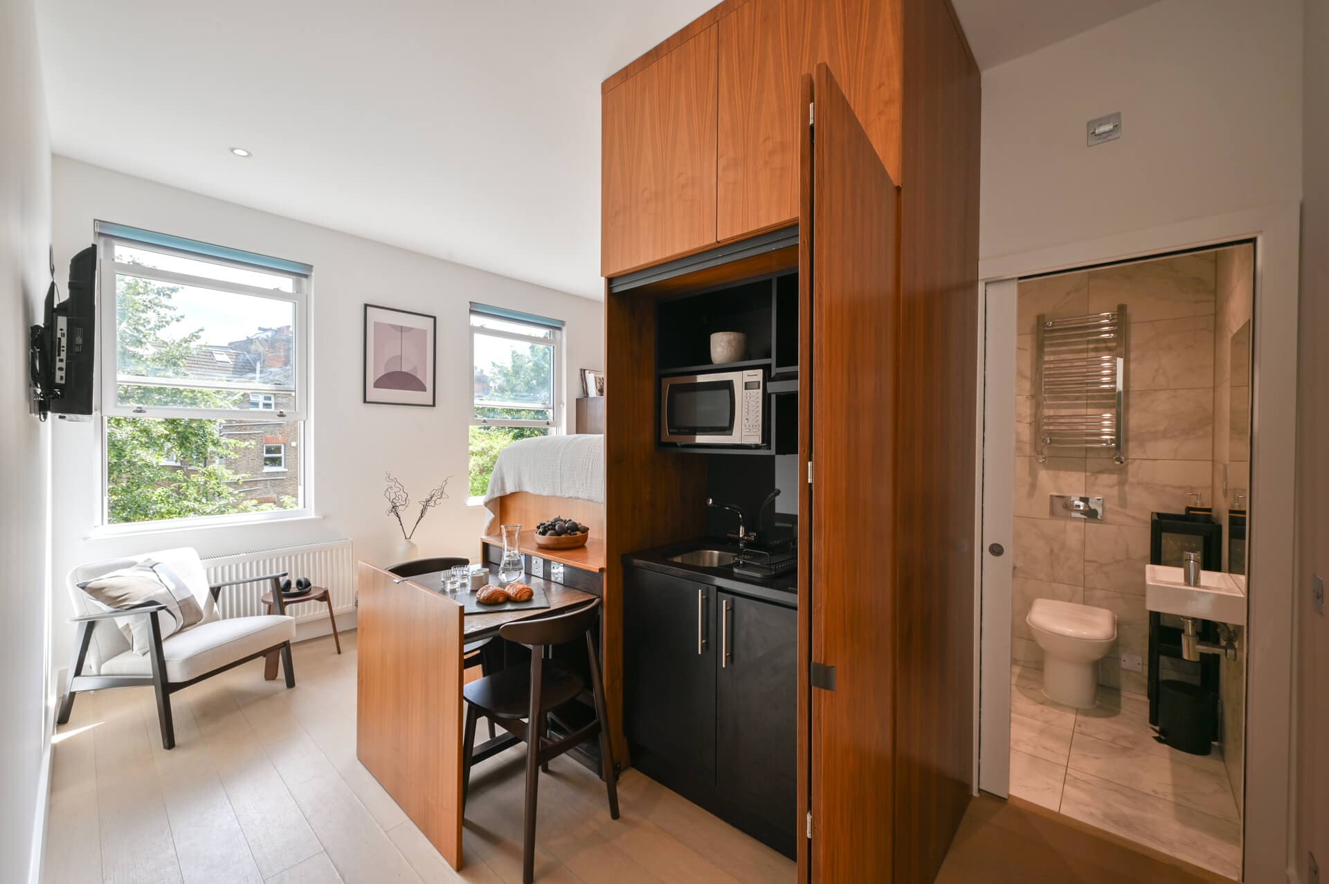 Modern Gravity Co West Hampstead studio with kitchenette, wood flooring and work desk