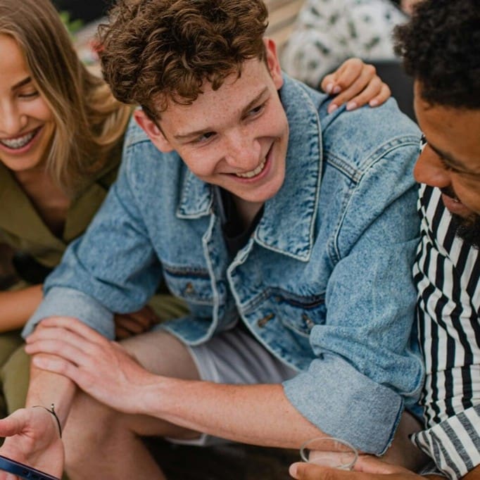 Gravity Co Student accommodation. Four students talking